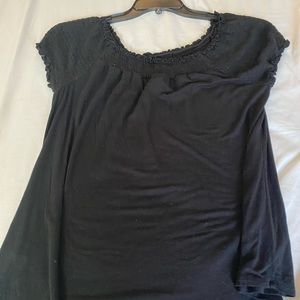 Black blouse. Scrunchy shoulders.